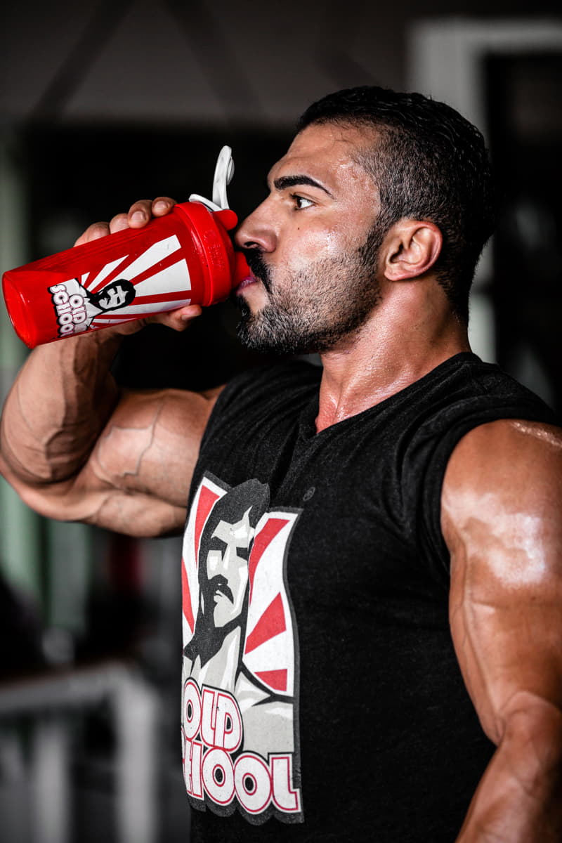 Athlete drinking from a shaker