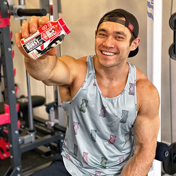 Athlete holding Vintage Burst bottle