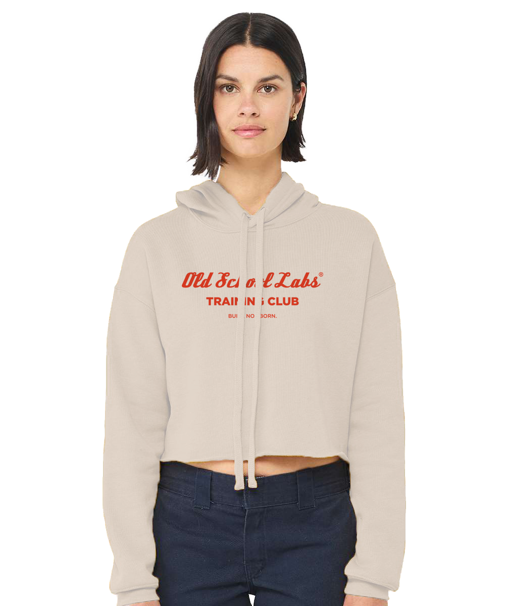 Woman wearing a beige hoodie