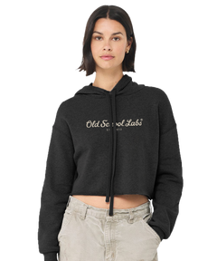 Woman wearing a heather grey hoodie