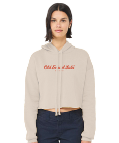 Woman wearing a beige hoodie