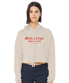 Woman wearing a beige hoodie