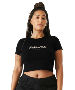 Woman wearing a black crop top with 'Old School Labs' logo
