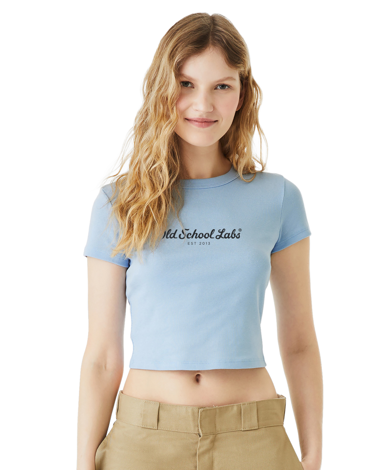 Woman wearing a blue crop top with 'Old School Labs' logo