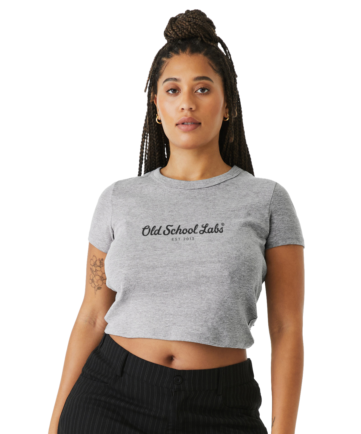 Woman wearing a grey crop top with 'Old School Labs' logo