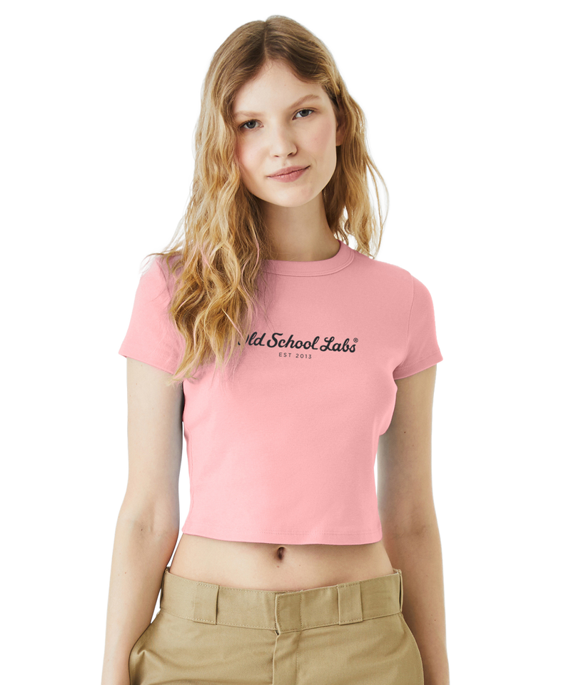 Woman wearing a pink crop top with 'Old School Labs' logo