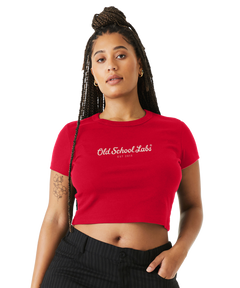 Woman wearing a red crop top with 'Old School Labs' logo