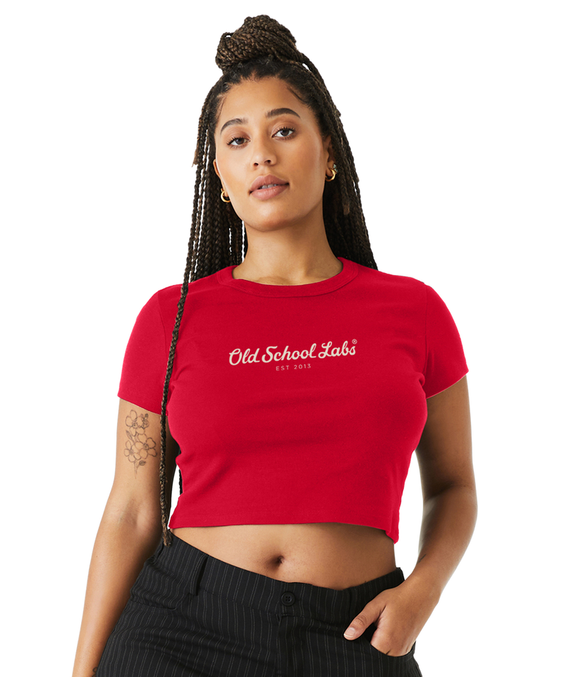 Woman wearing a red crop top with 'Old School Labs' logo
