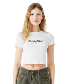 Woman wearing a white crop top with 'Old School Labs' logo