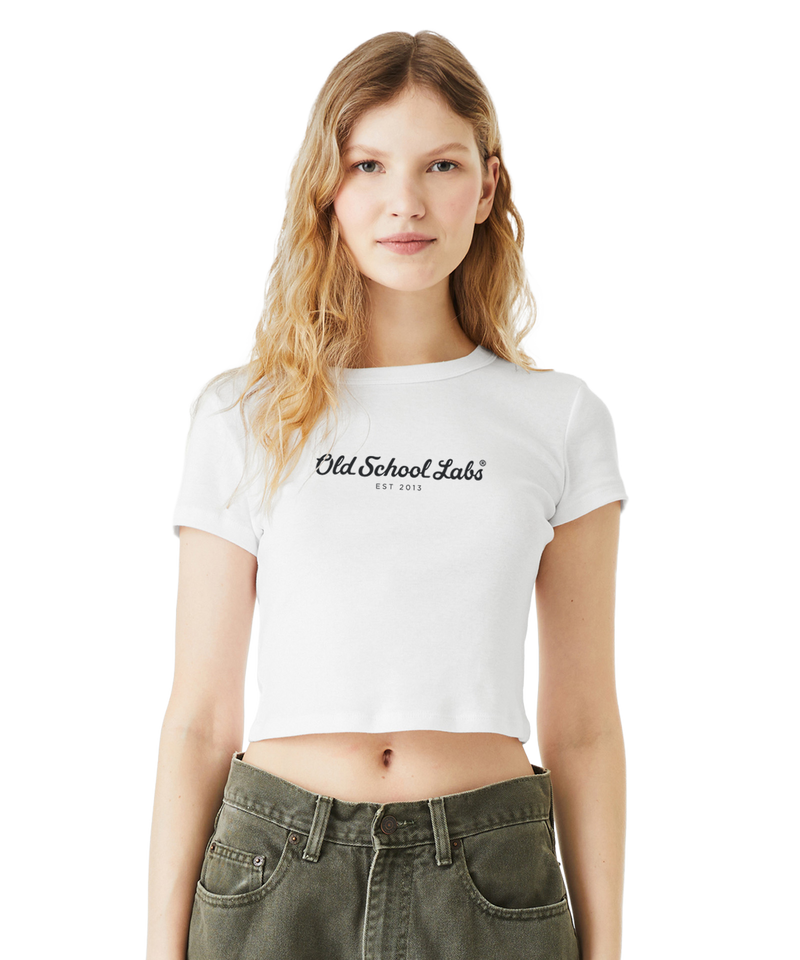 Woman wearing a white crop top with 'Old School Labs' logo